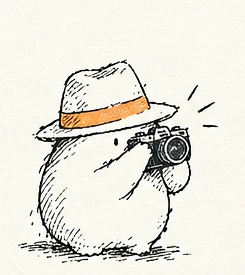 Маскот WEMMS фотографирует